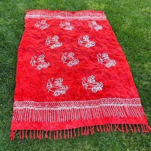 Beautiful red and white batik sarong with fringe
